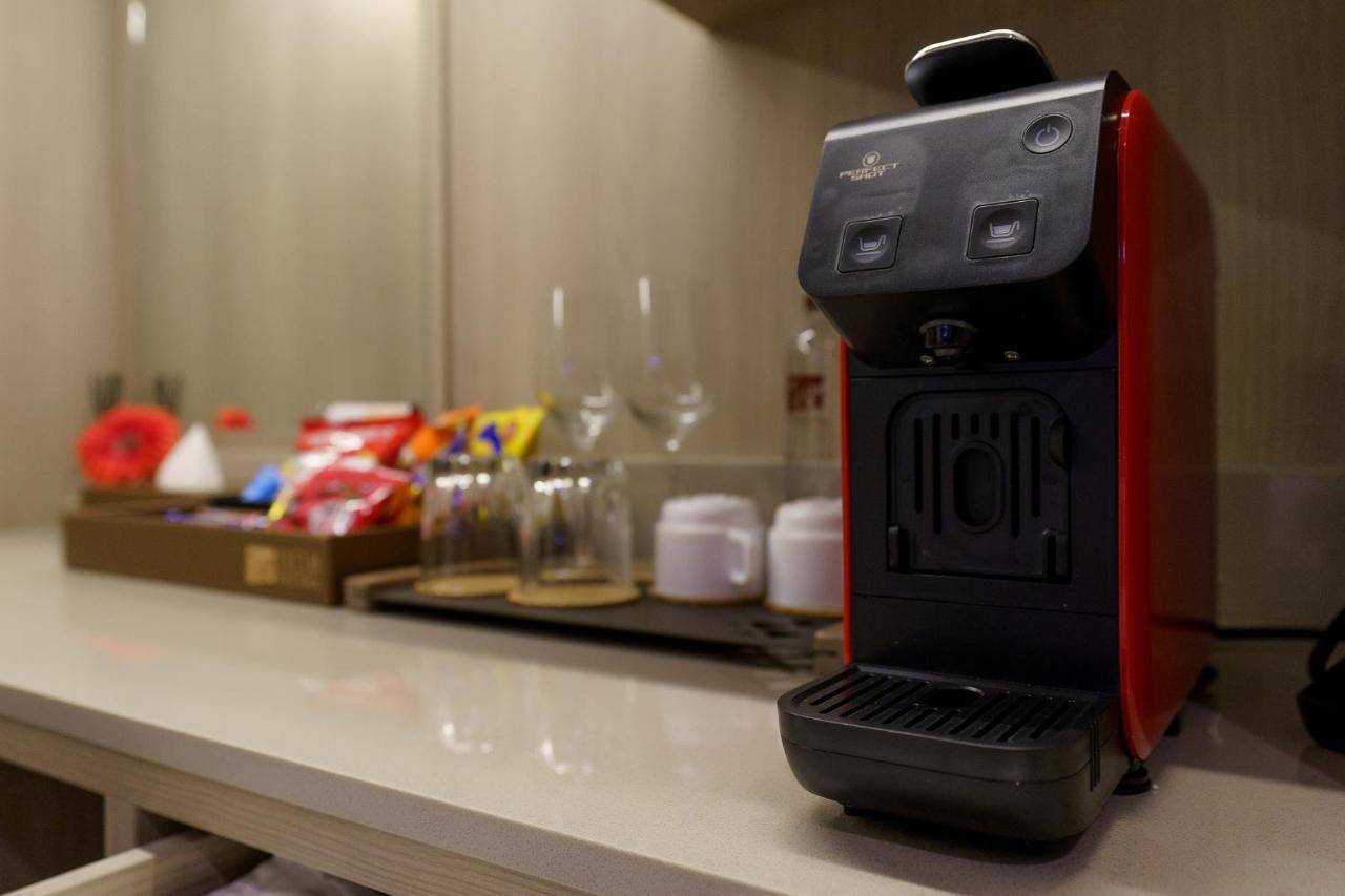 Fifth Pattaya Jomtien By Shiwalai Int Hotel Exterior photo A Nespresso coffee machine