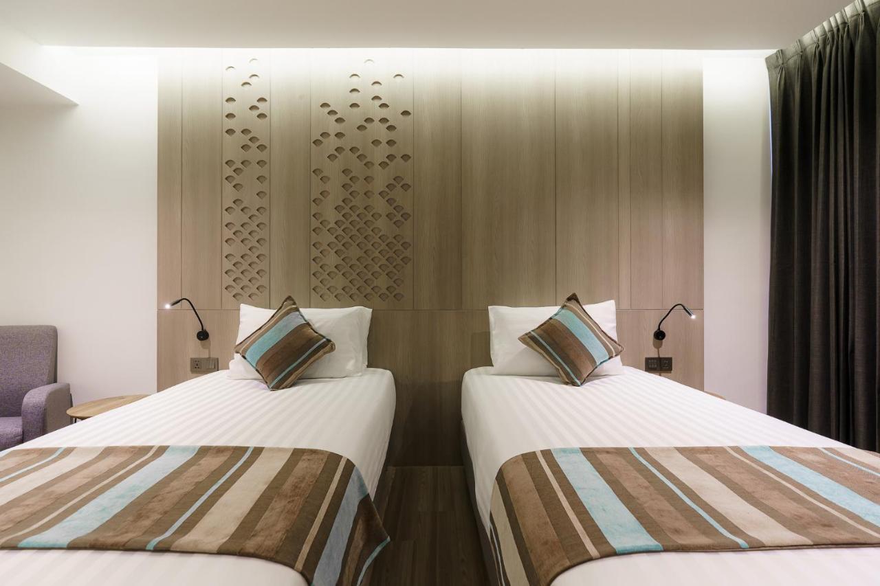 Fifth Pattaya Jomtien By Shiwalai Int Hotel Exterior photo A room at the hotel